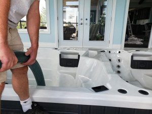 1500 gallon pumped through a window with brand new-casings and trim and flooring completed around the spa