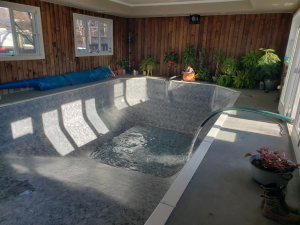 Just another December day.  Whistling Christmas carols and filling a pool!